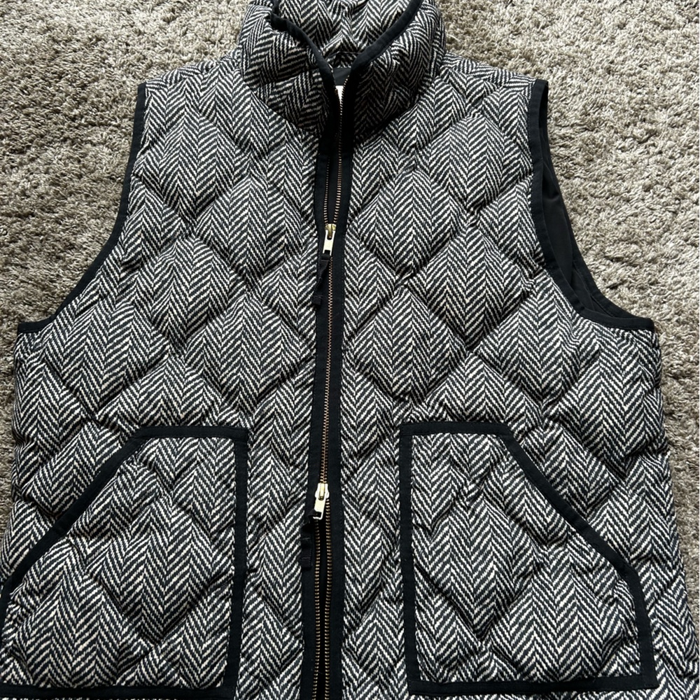 Black and light tan J. Crew Quilted Vest. Size medium.